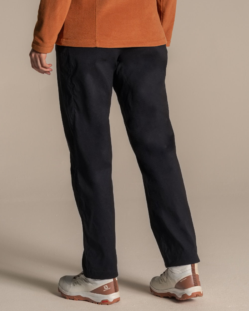 Black Coloured Womens KiwiPro Barrel Trouser on Beige Background 