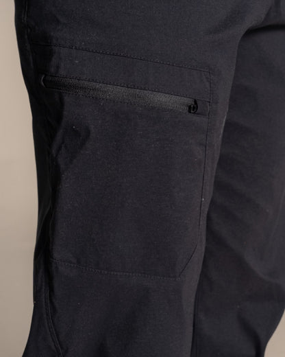 Black Coloured Womens KiwiPro Barrel Trouser on Beige Background 