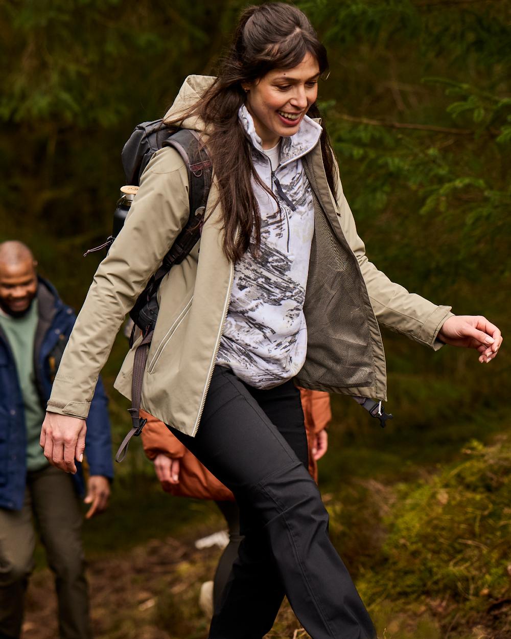 Black coloured Craghoppers Womens Kiwi Pro Cargo Trousers on forest background 
