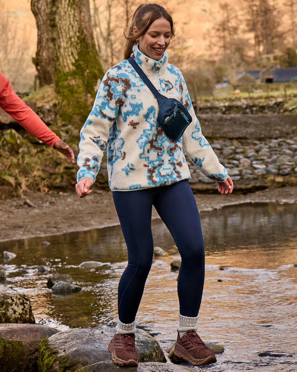 Blue Navy Coloured Craghoppers Womens Kiwi Pro Leggings On A forest Background 