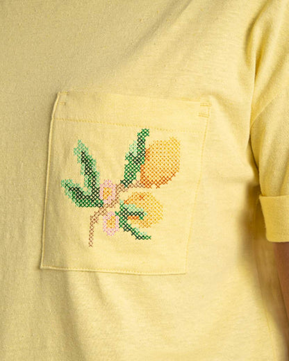 Pale Daffodil coloured Craghoppers Womens Maya Short Sleeved T-Shirt on white background 