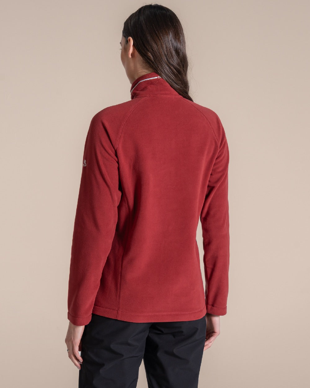Carmine Red Coloured Craghoppers Womens Miska Half-Zip Fleece on beige background 