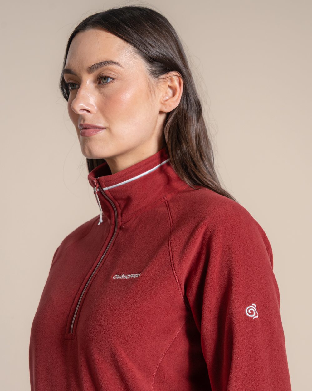 Carmine Red Coloured Craghoppers Womens Miska Half-Zip Fleece on beige background 