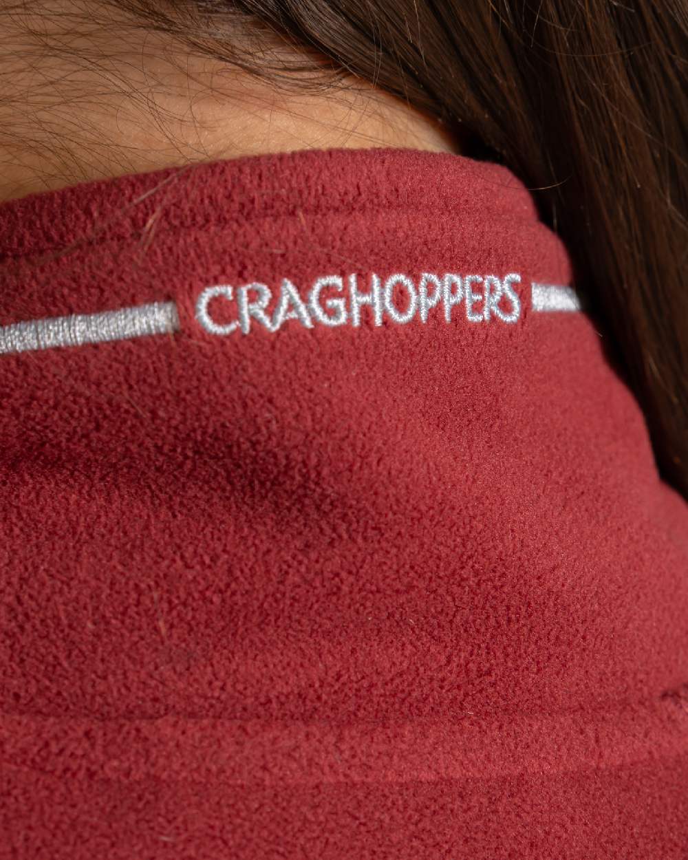 Carmine Red Coloured Craghoppers Womens Miska Half-Zip Fleece on beige background 