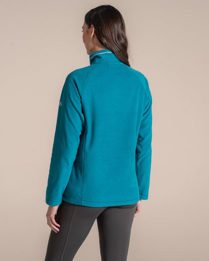 Empress Teal Coloured Craghoppers Womens Miska Half-Zip Fleece on beige background 