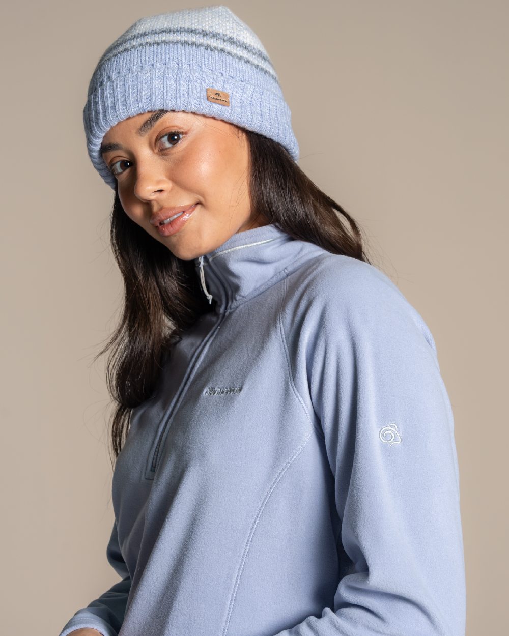 Mist Blue Coloured Craghoppers Womens Miska Half-Zip Fleece on beige background 