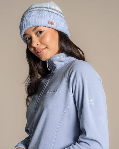 Mist Blue Coloured Craghoppers Womens Miska Half-Zip Fleece on beige background 