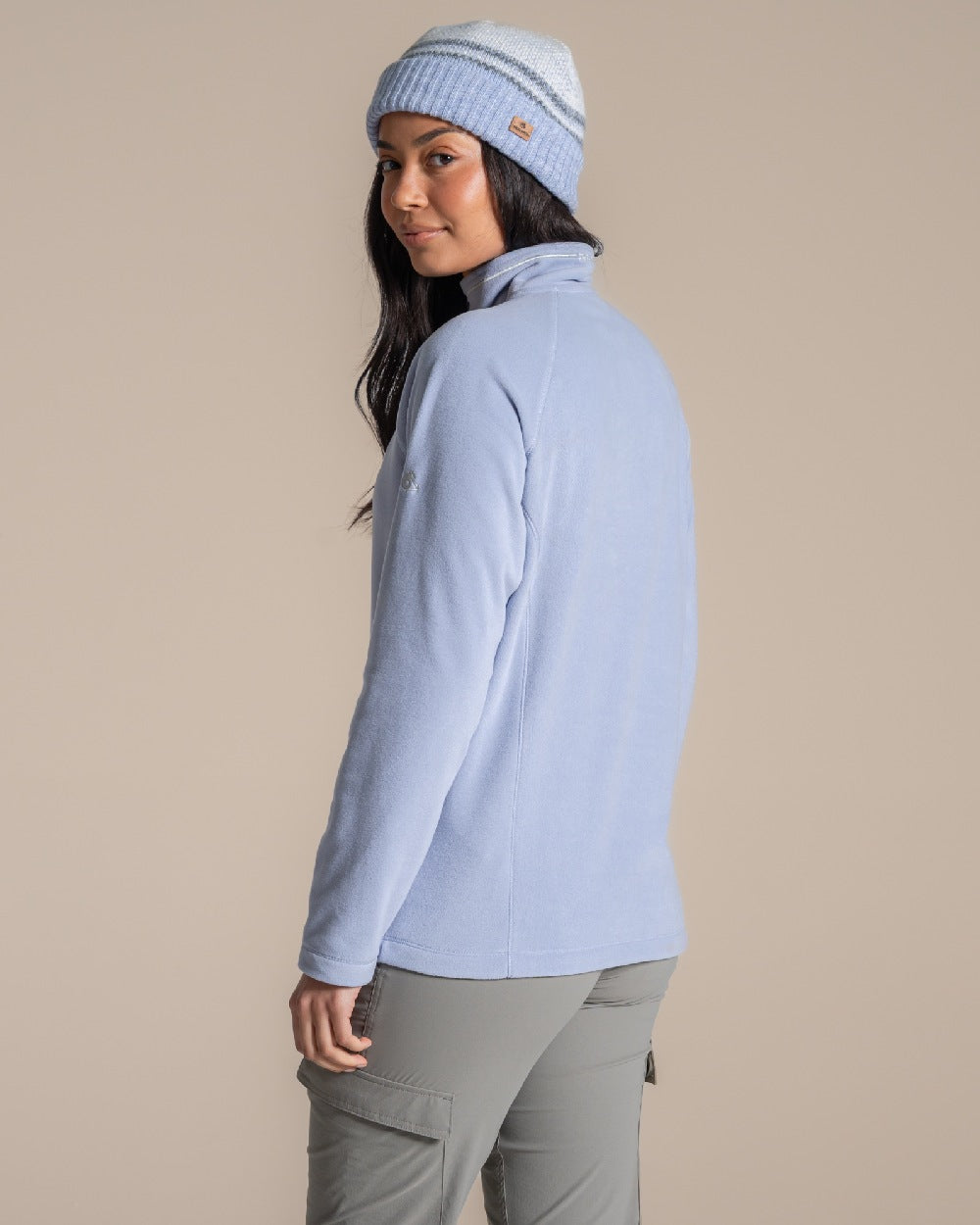 Mist Blue Coloured Craghoppers Womens Miska Half-Zip Fleece on beige background 