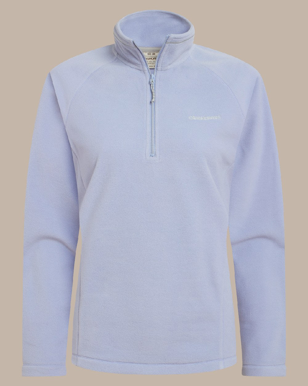 Mist Blue Coloured Craghoppers Womens Miska Half-Zip Fleece on beige background 