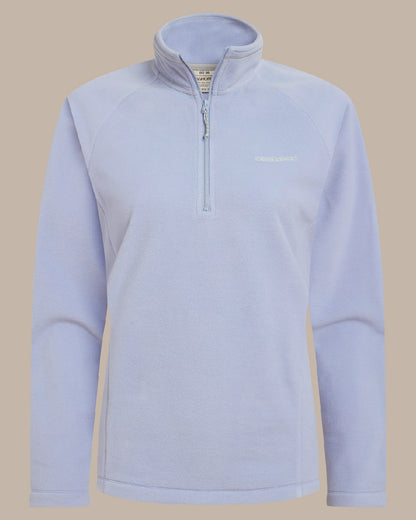 Mist Blue Coloured Craghoppers Womens Miska Half-Zip Fleece on beige background 