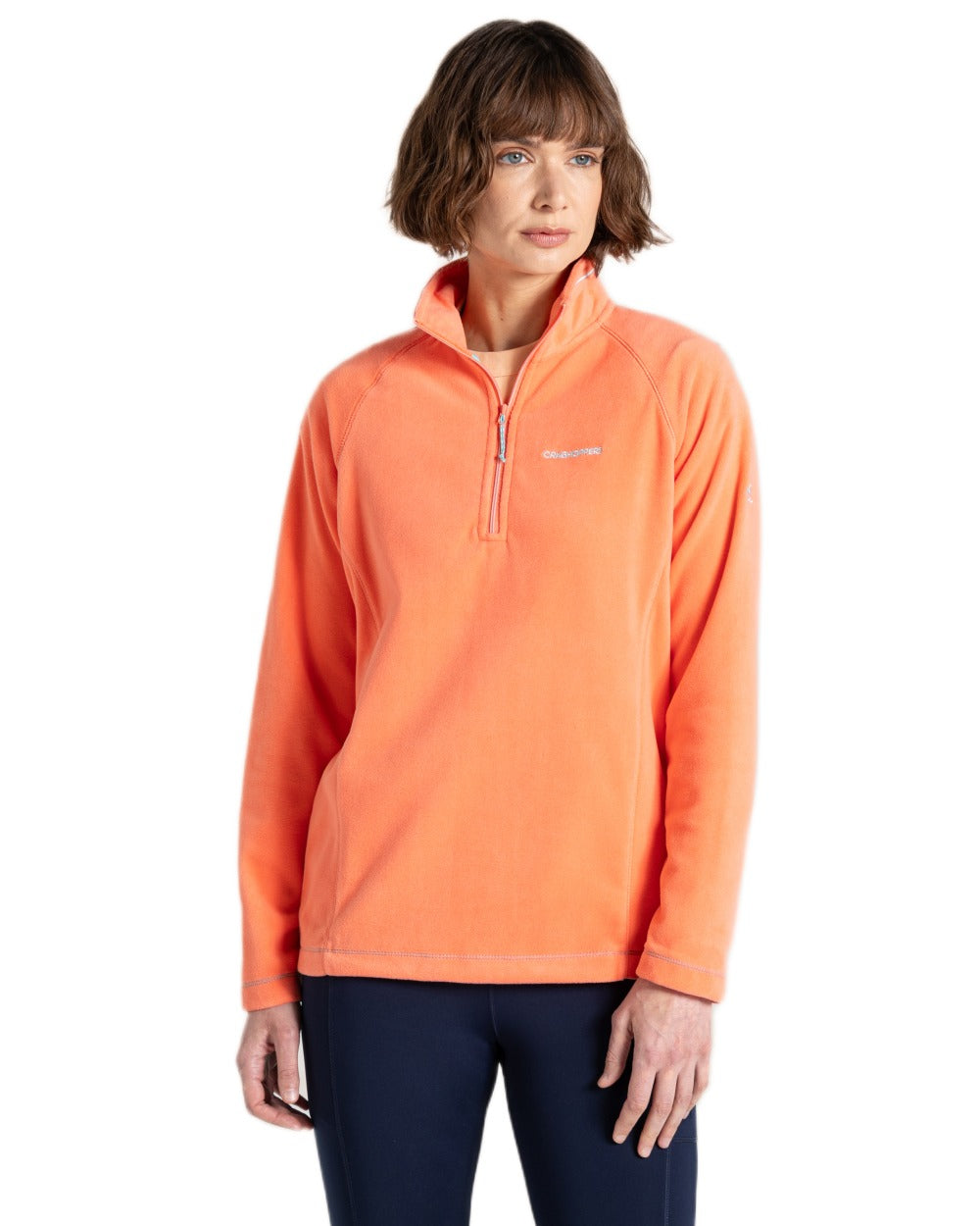 Fusion Coral coloured Craghoppers Womens Miska VI Half-Zip Fleece on white background 