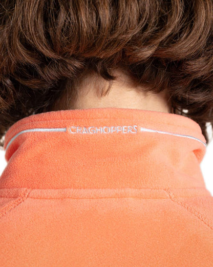 Fusion Coral coloured Craghoppers Womens Miska VI Half-Zip Fleece on white background 