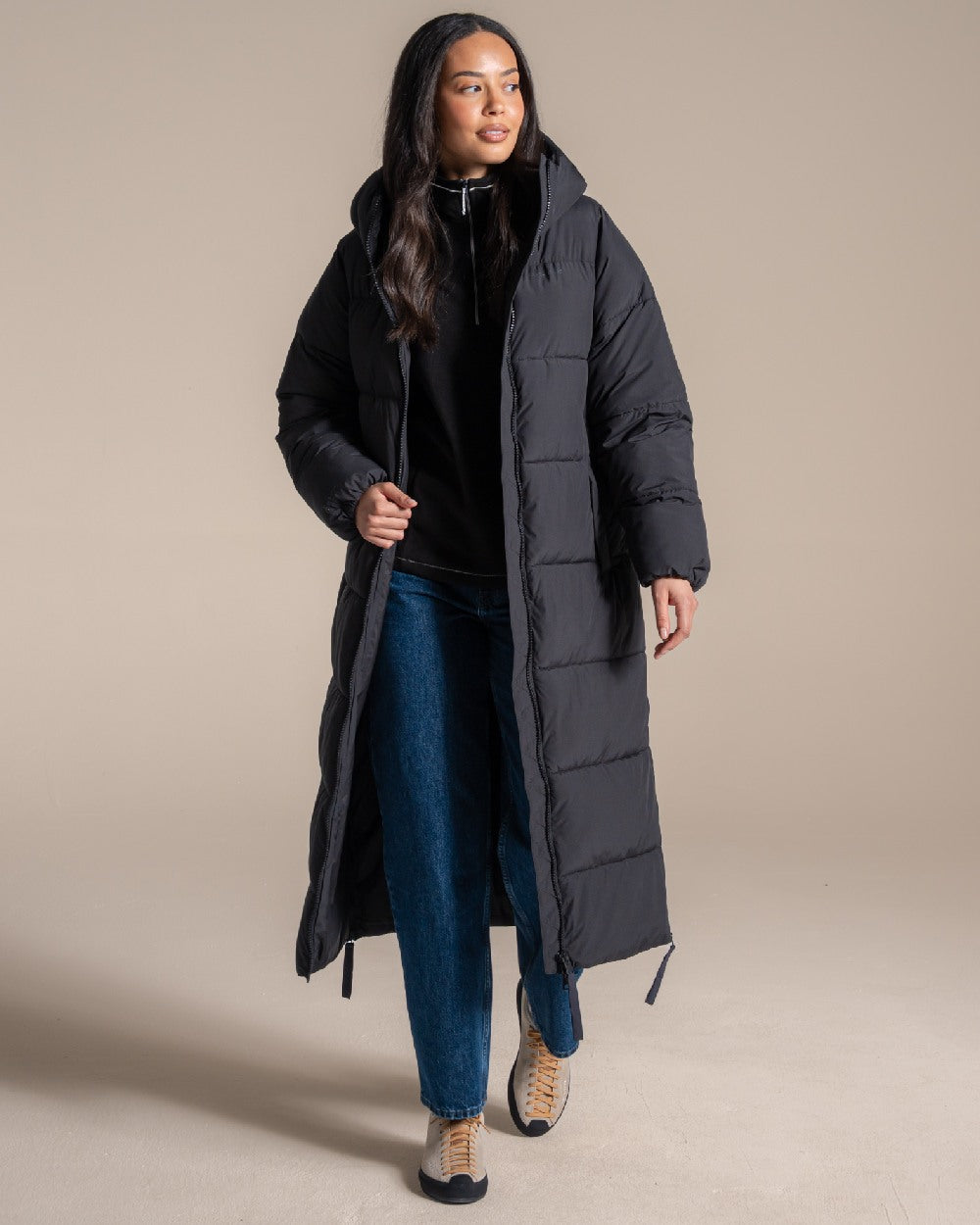 Black coloured Craghoppers Womens Narlia II Hooded Jacket on beige background 