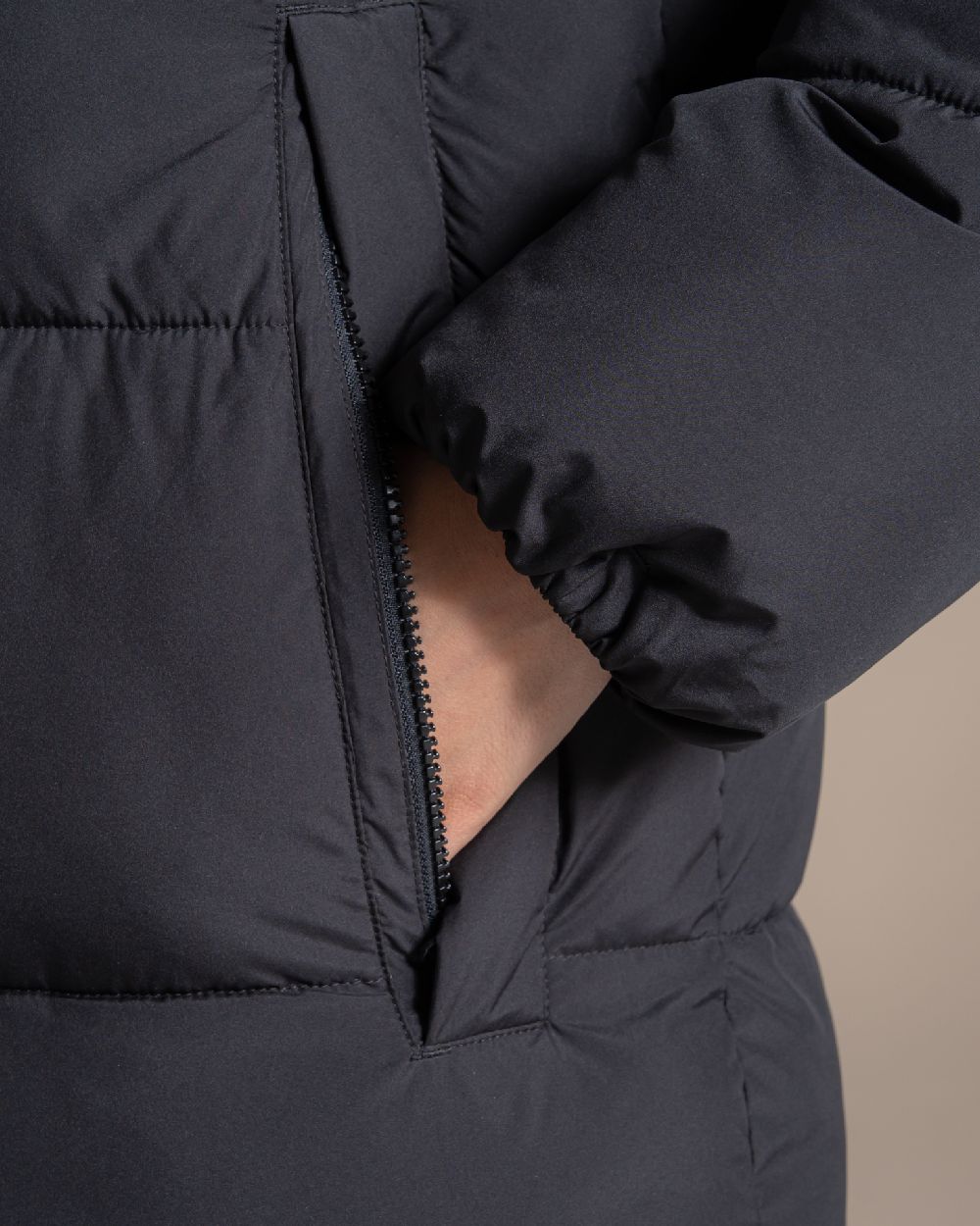 Black coloured Craghoppers Womens Narlia II Hooded Jacket on beige background 