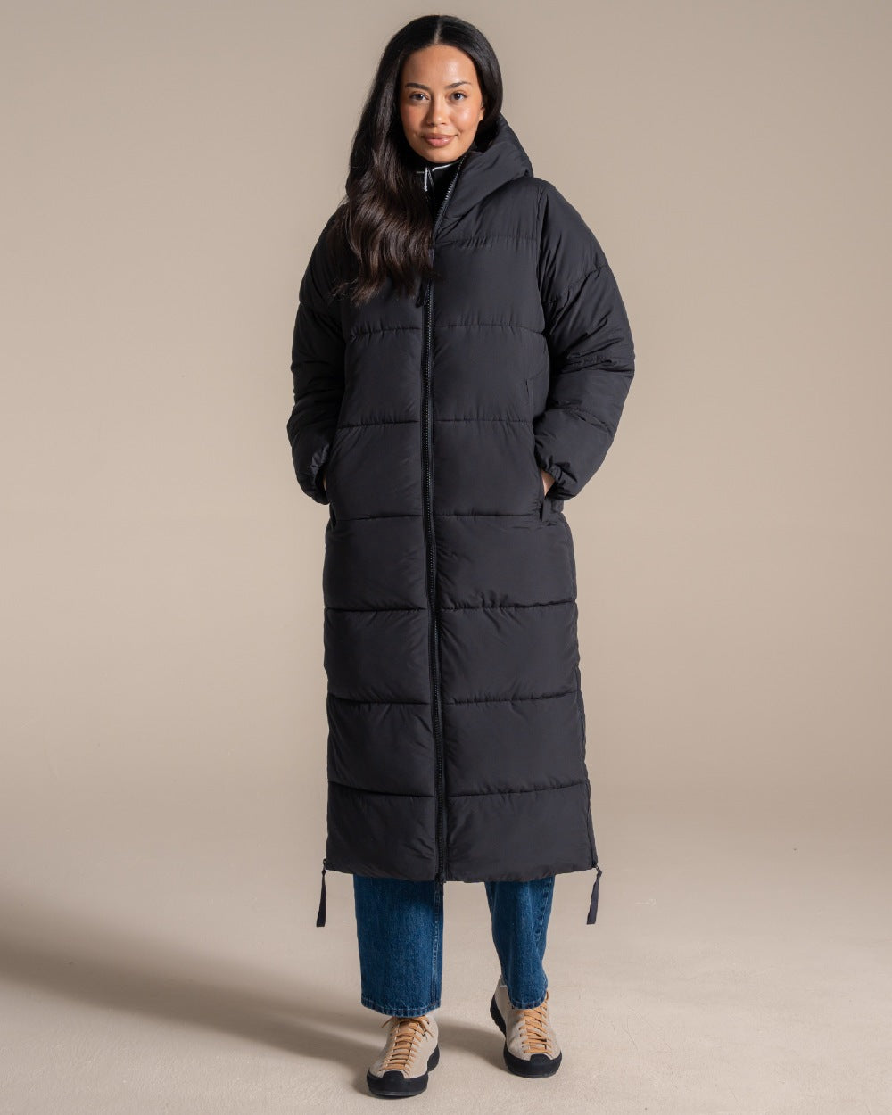 Black coloured Craghoppers Womens Narlia II Hooded Jacket on beige background 