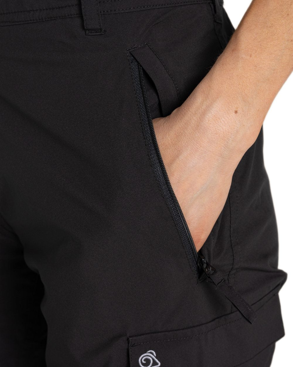 Black coloured Craghoppers Womens Natales Waterproof Lightweight Cargo Trousers on white background 
