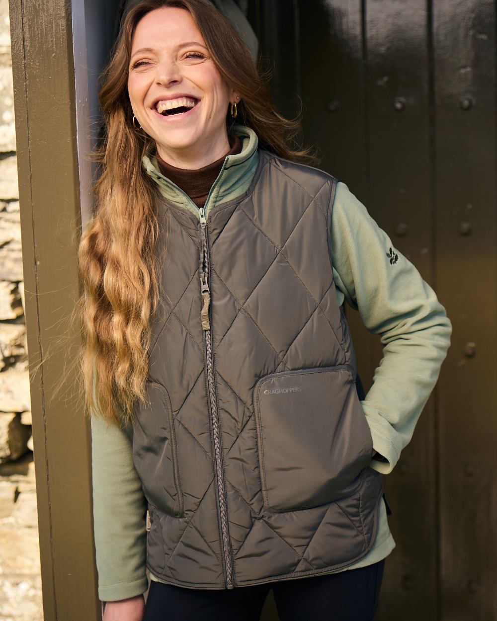 Nori Green coloured Craghoppers Womens National Trust Borage Vest on outdoor background 
