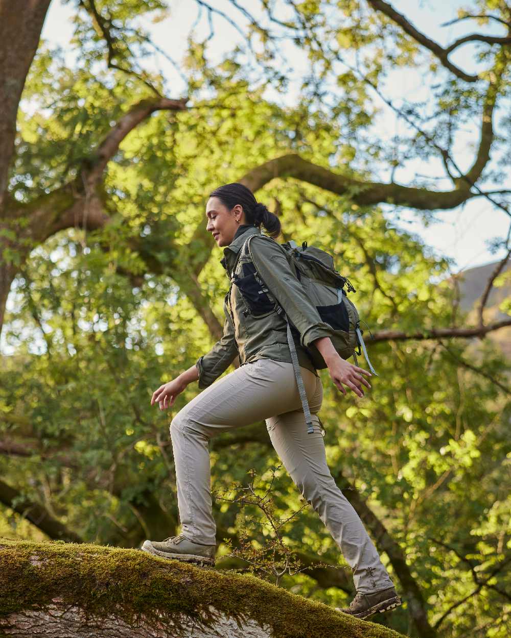 Wild Olive coloured Craghoppers Womens NosiLife Adventure Long Sleeved Shirt III on tree background 
