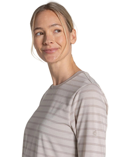 Oyster Stripe coloured Craghoppers Womens NosiLife Akona Long Sleeved Top on white background 