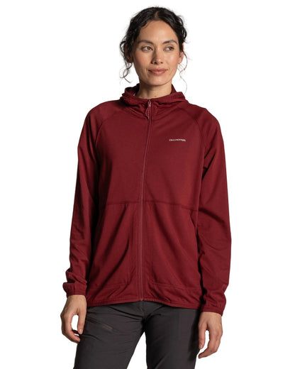 Riad Red coloured Craghoppers Womens NosiLife Aya Hooded Jacket on white background 