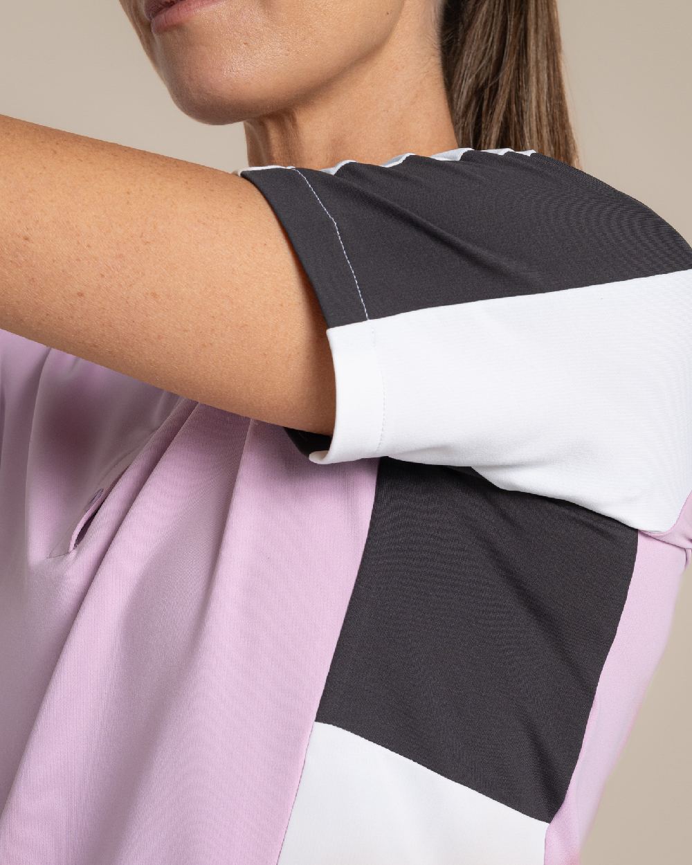 Orchid White Craghoppers omens Nosilife Hazelmere Short Sleeved Polo Top on Beige Background 