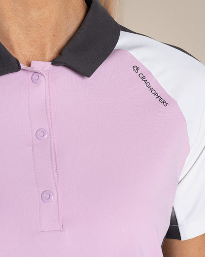 Orchid White Craghoppers omens Nosilife Hazelmere Short Sleeved Polo Top on Beige Background 