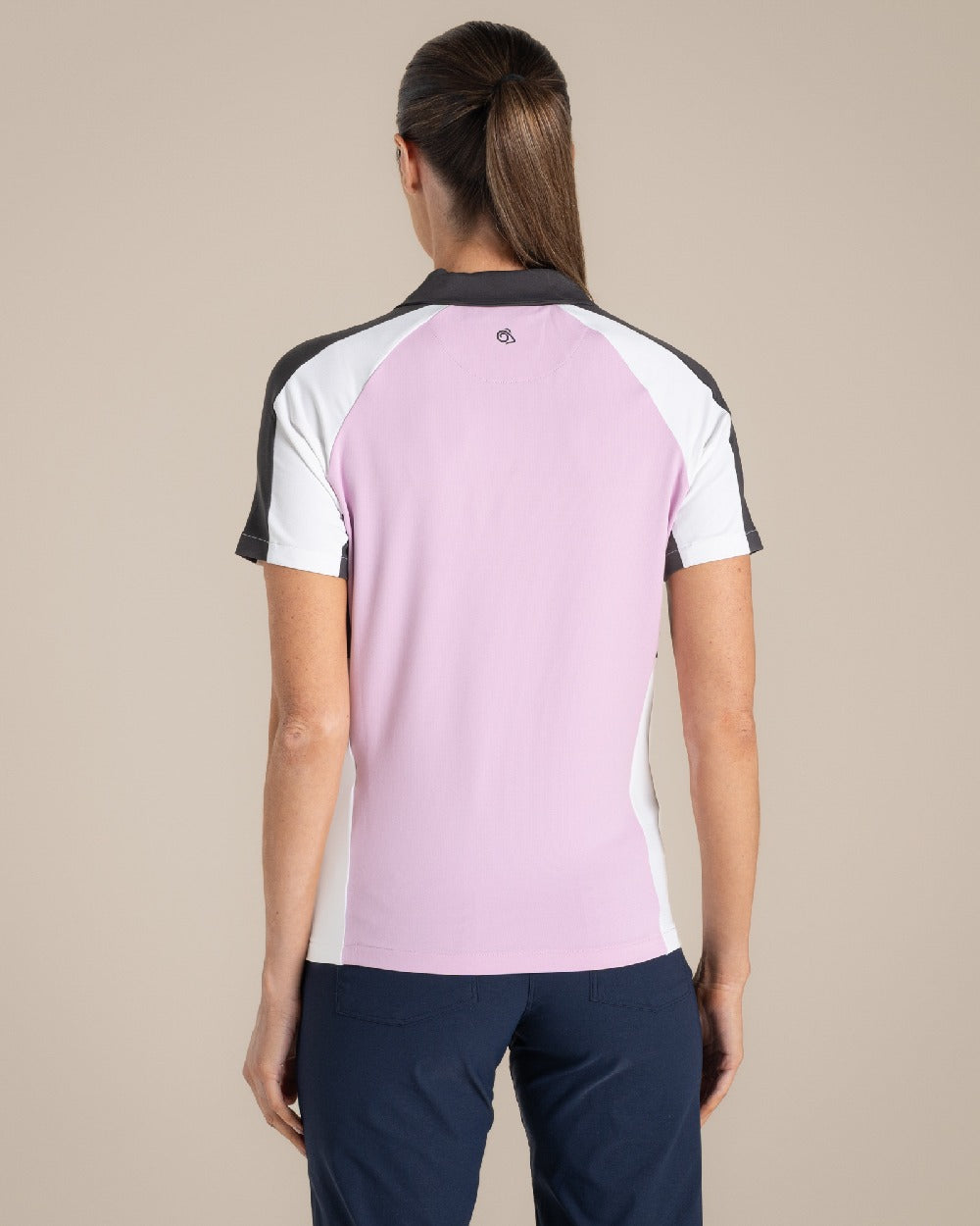 Orchid White Craghoppers omens Nosilife Hazelmere Short Sleeved Polo Top on Beige Background 