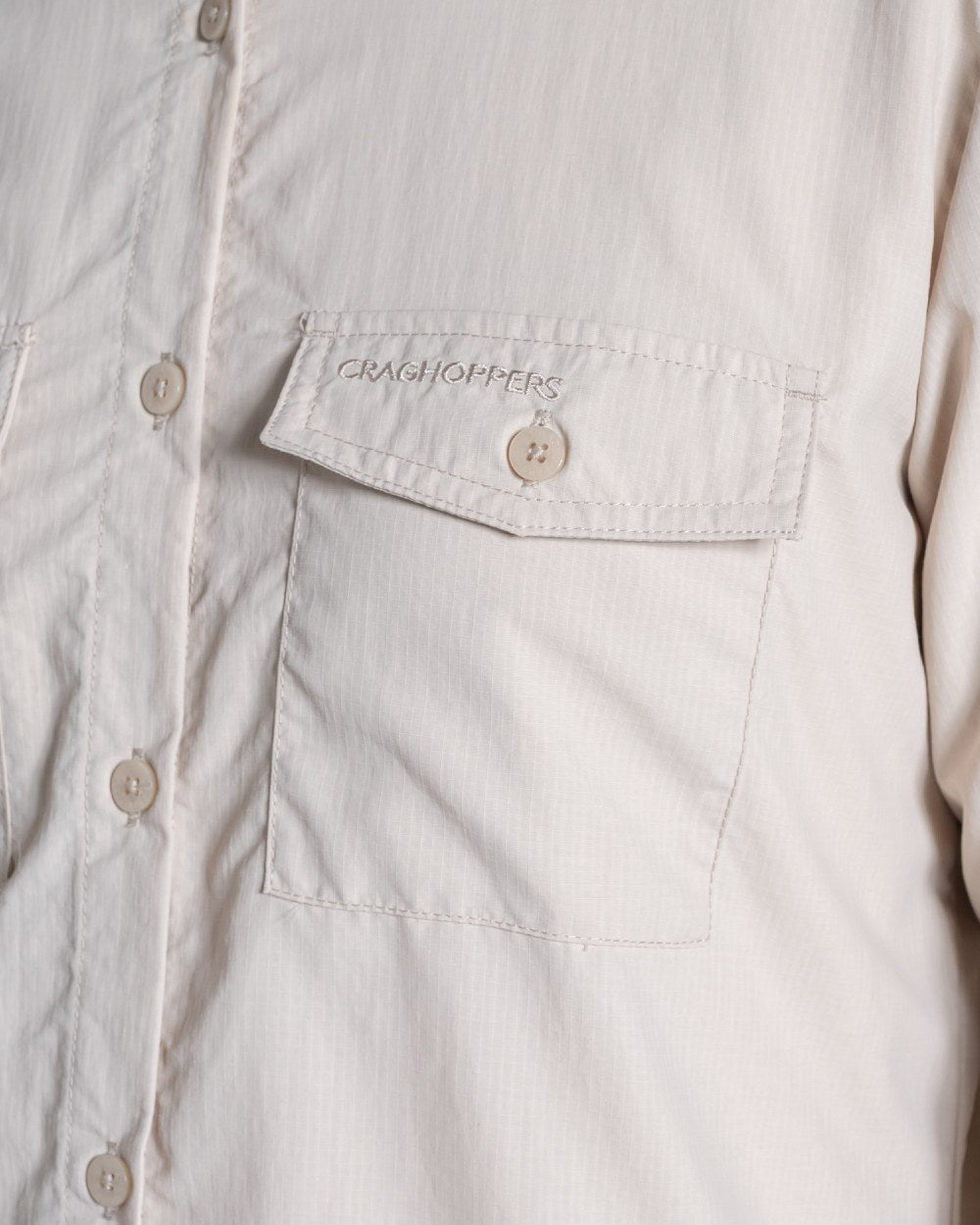Oyster coloured Craghoppers Womens NosiLife Loukkos Long Sleeved Shirt on white background 