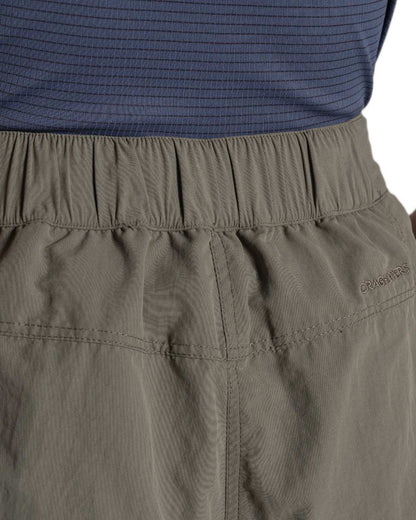 Wild Olive coloured Craghoppers Womens NosiLife Medina Cargo Shorts on white background 