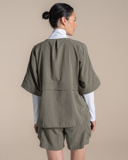 Wild Olive Coloured Craghoppers Womens Nosilife Medina Short Sleeved Overhead Shirt on Beige Background 
