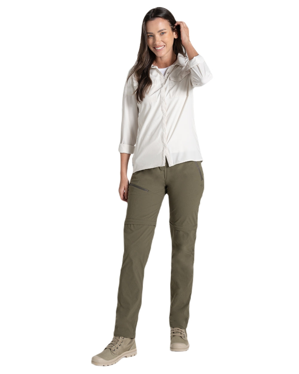 Wild Olive coloured Craghoppers Womens NosiLife Pro Convertible Trousers on white background 
