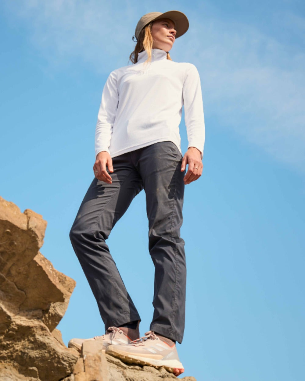 Dark Iron coloured Craghoppers Womens NosiLife Rif Stretch Cargo Trousers on mountain background 