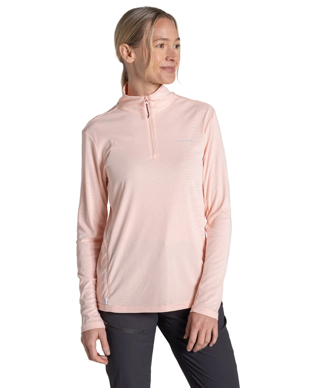 Sherbert coloured Craghoppers Womens NosiLife SolarShield+ Half Zip Top on white background 