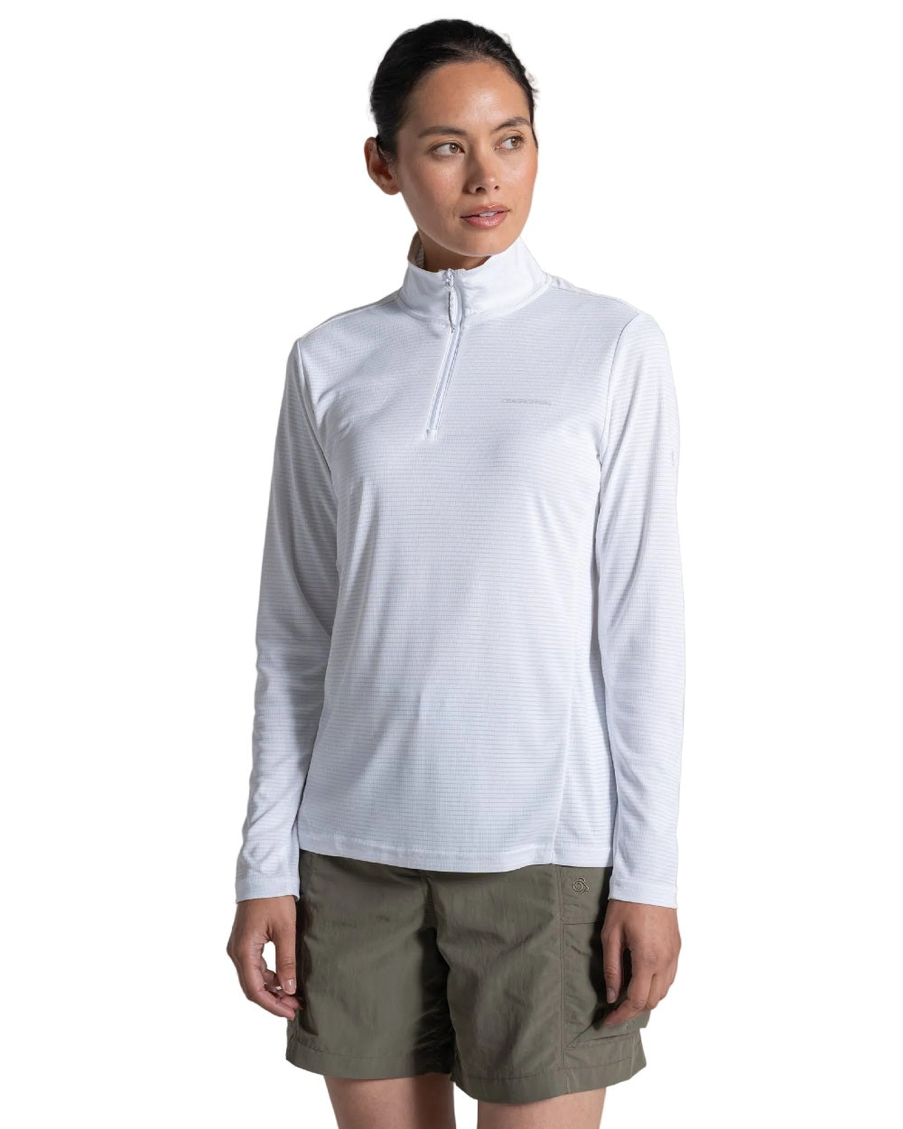 White coloured Craghoppers Womens NosiLife SolarShield+ Half Zip Top on white background 