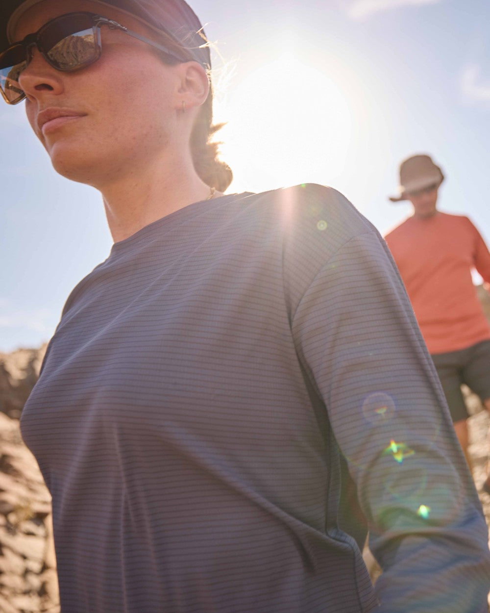 Anthracite coloured Craghoppers Womens NosiLife SolarShield+ Long Sleeved T-Shirt on mountain background 