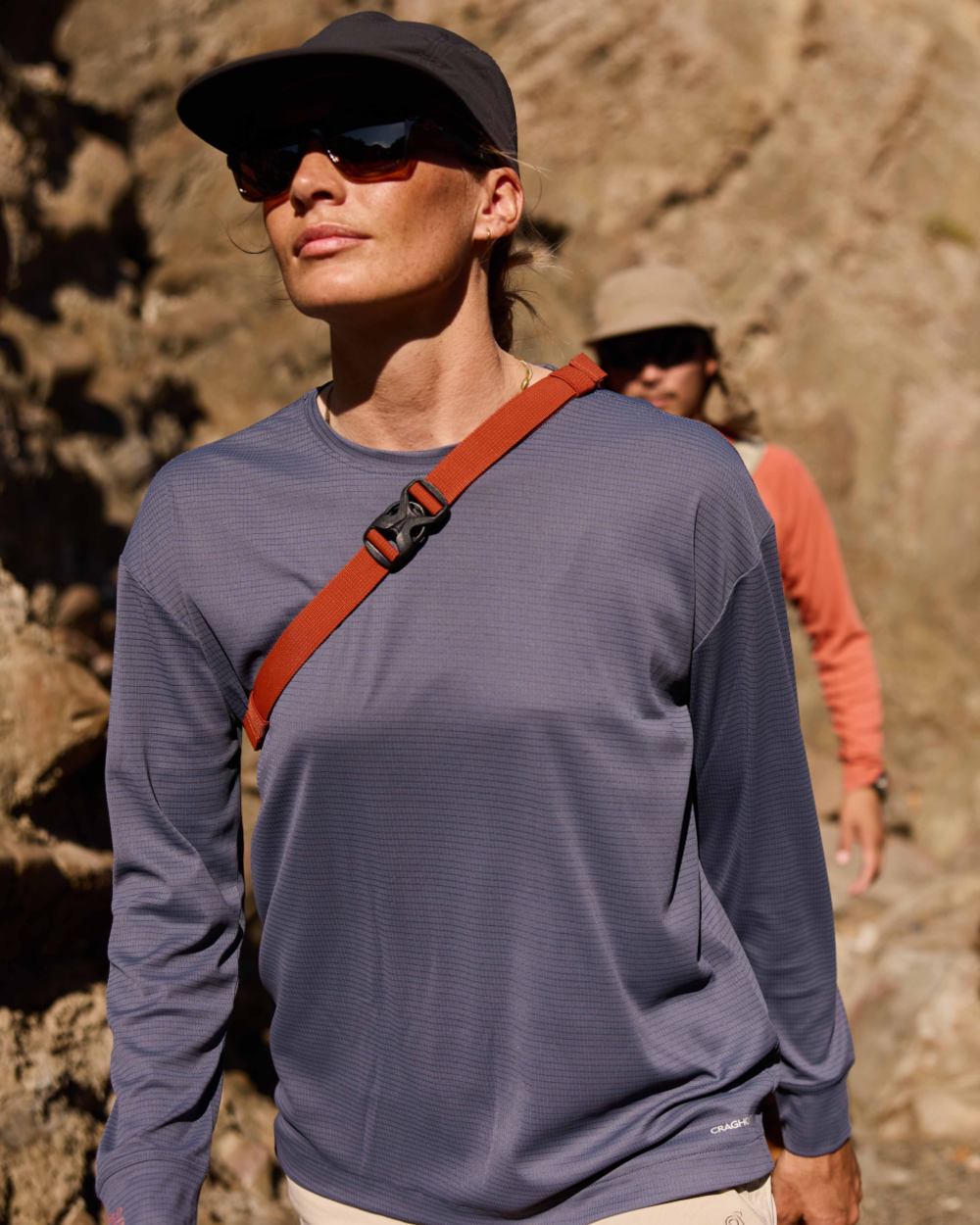 Anthracite coloured Craghoppers Womens NosiLife SolarShield+ Long Sleeved T-Shirt on mountain background 