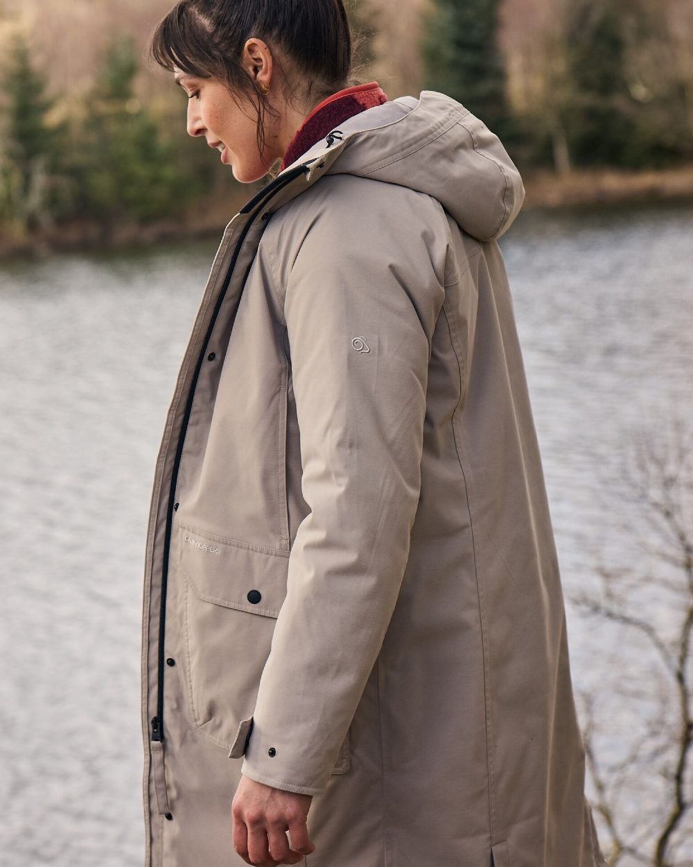 Soft Mushroom Coloured Craghoppers Womens Rosalind II Jacket on lake background 