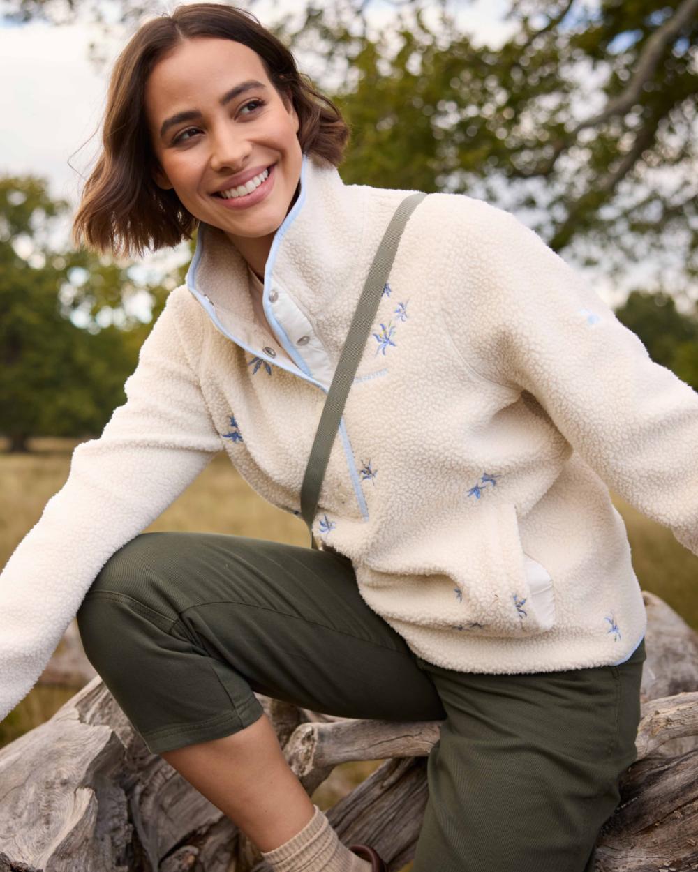 Ecru Floral Coloured Craghoppers Womens Rosemary Overhead Top on forest background 