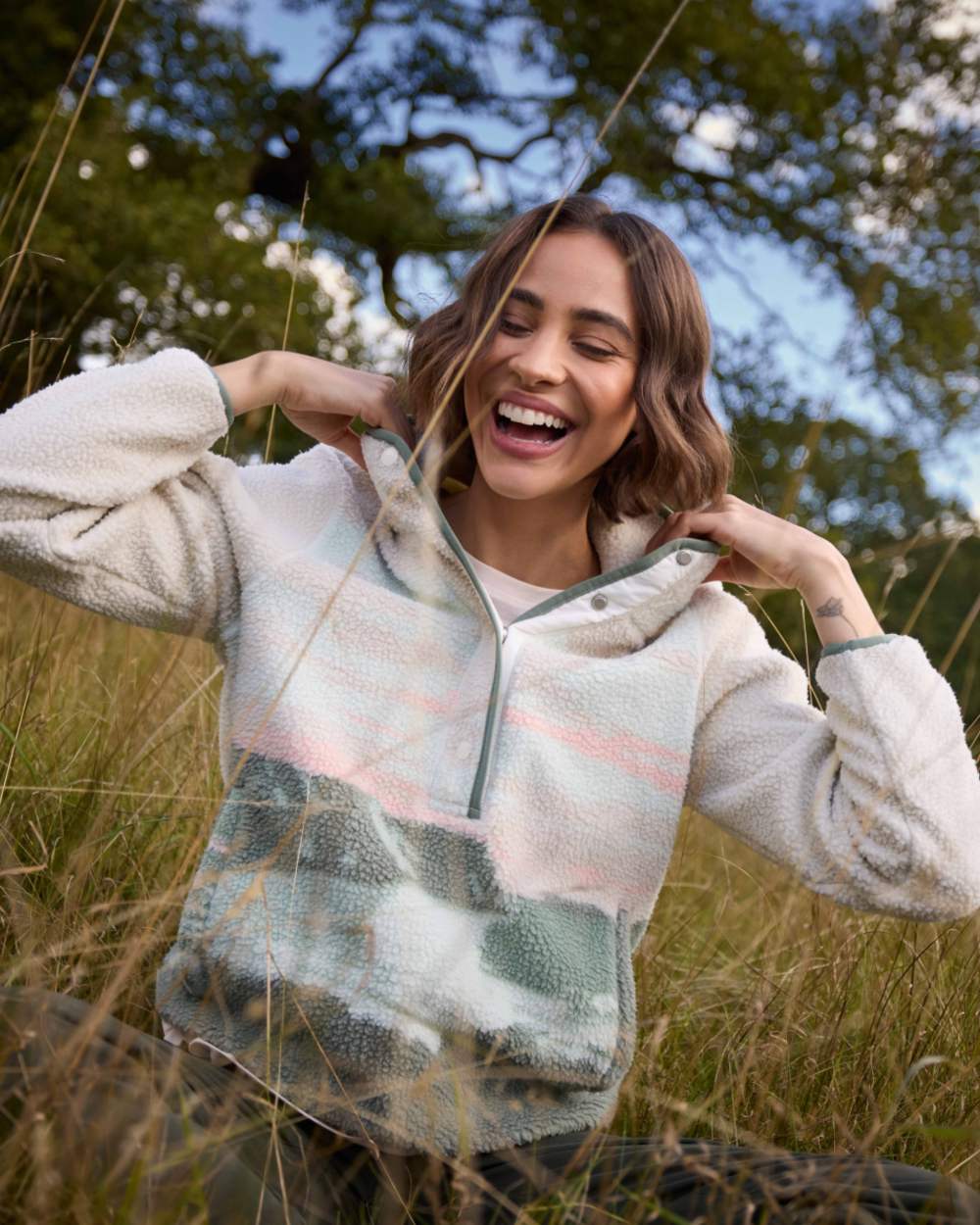 Oyster Print Coloured Craghoppers Womens Rosemary Overhead Top on forest background 