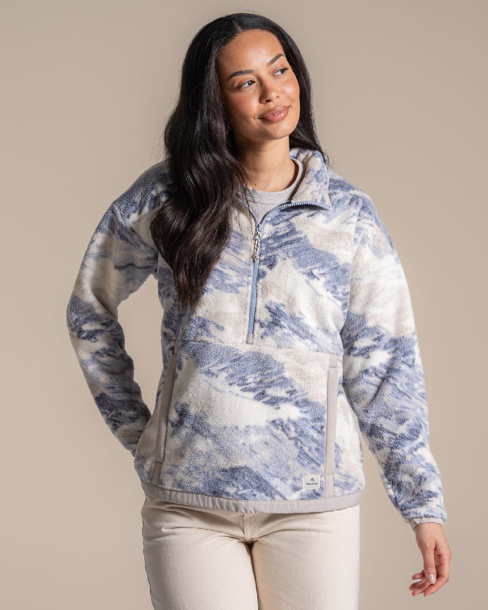 Mist Blue coloured Craghoppers Womens Sanaa Half Zip on beige background 