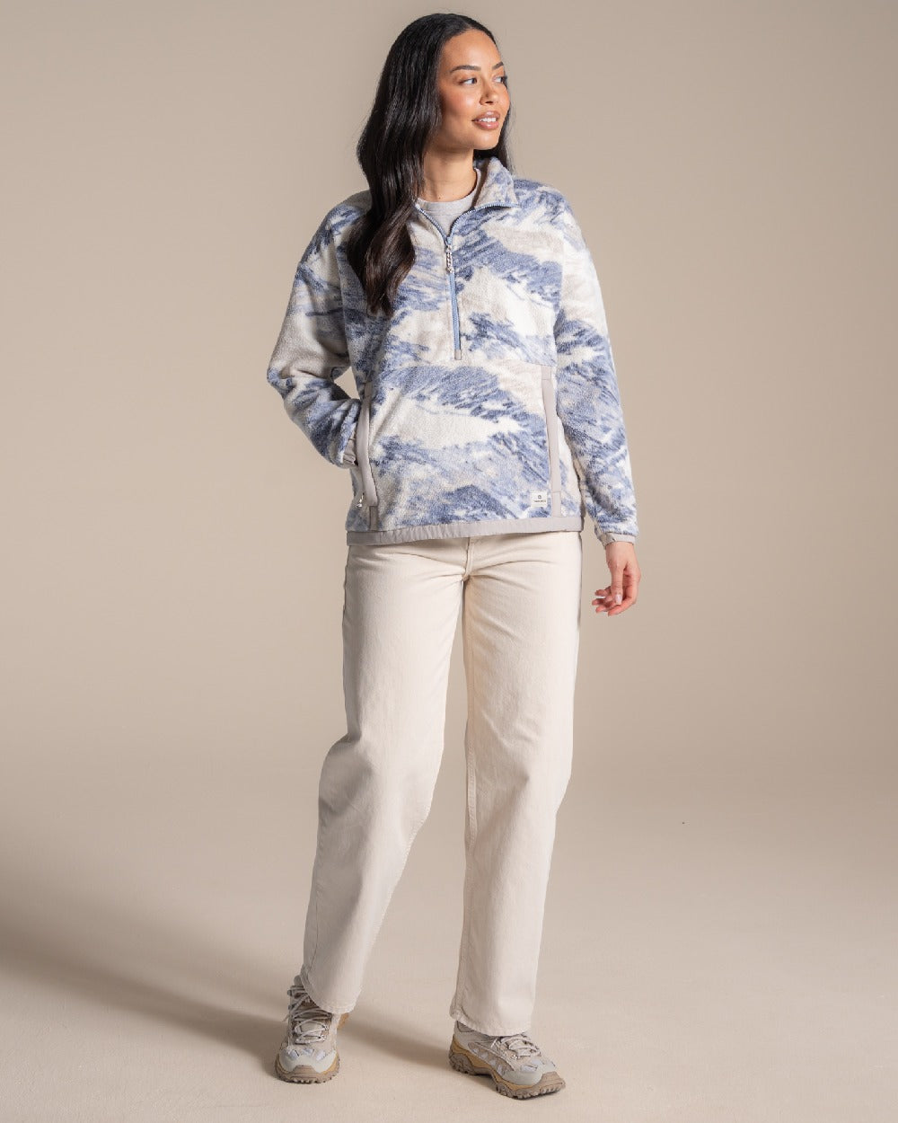 Mist Blue coloured Craghoppers Womens Sanaa Half Zip on beige background 