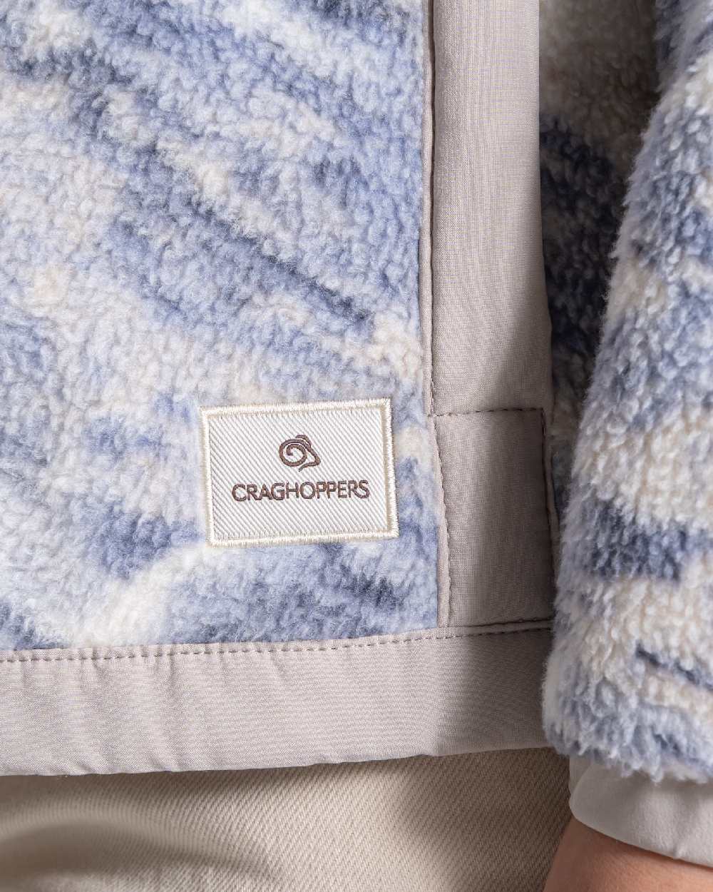 Mist Blue coloured Craghoppers Womens Sanaa Half Zip on beige background 
