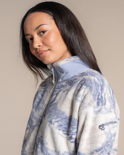 Mist Blue coloured Craghoppers Womens Sanaa Half Zip on beige background 