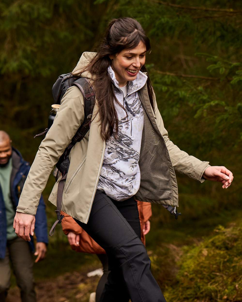 Vert coloured Craghoppers Womens Solla Waterproof Jacket on forest background 