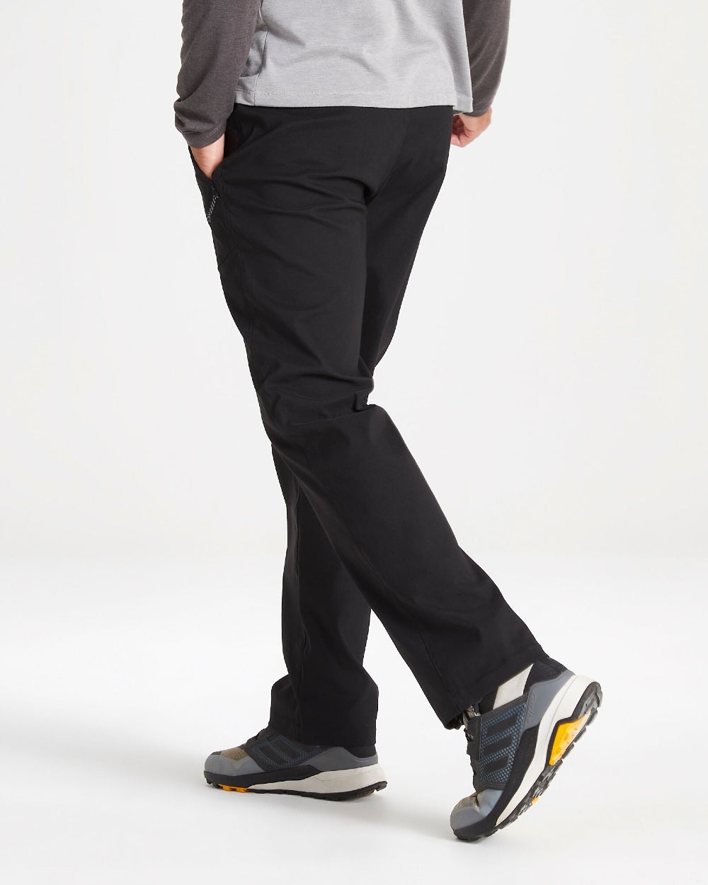 Black Coloured Craghoppers Mens Kiwi Pro II Trousers On A Grey Background 