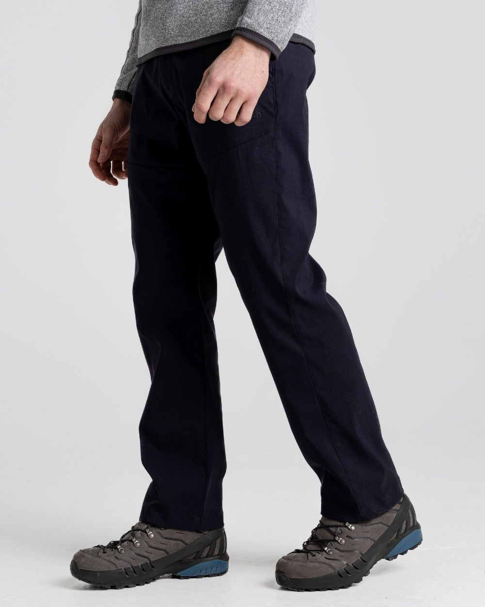 Dark Navy Coloured Craghoppers Mens Kiwi Pro II Trousers On A Grey Background 