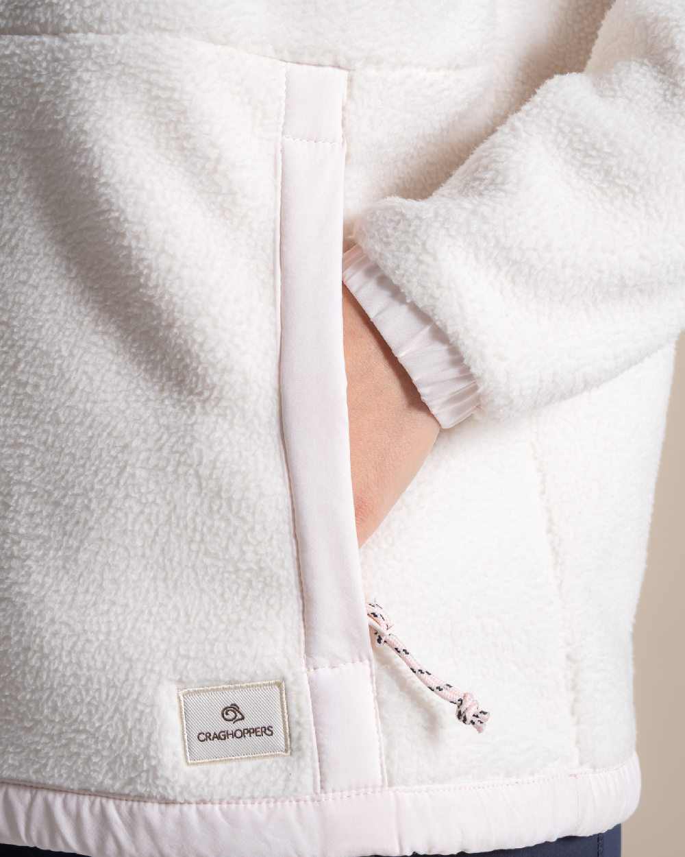 Ecru coloured Craghoppers Womens Sanaa Half Zip on beige background 