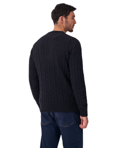 Navy Coloured Crew Clothing Mens Oarsman Cable Knit Organic Cotton Crew Neck Jumper on white background 
