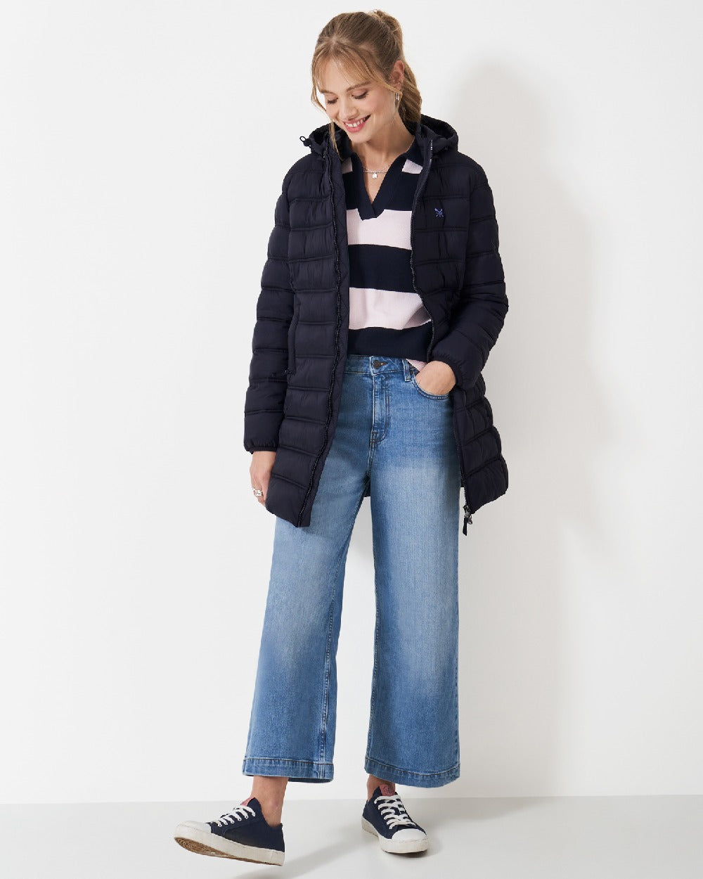 Dark Navy Coloured Crew Clothing Womens Lightweight Padded Coat on indoor background 