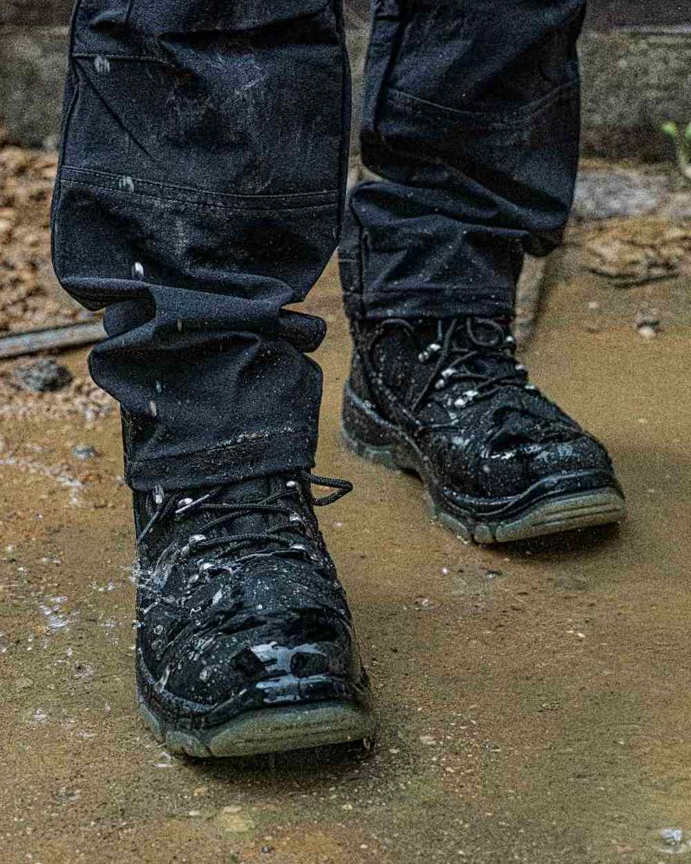 Black Coloured DeWalt Challenger Waterproof Safety Hiker Boots on outdoor background 